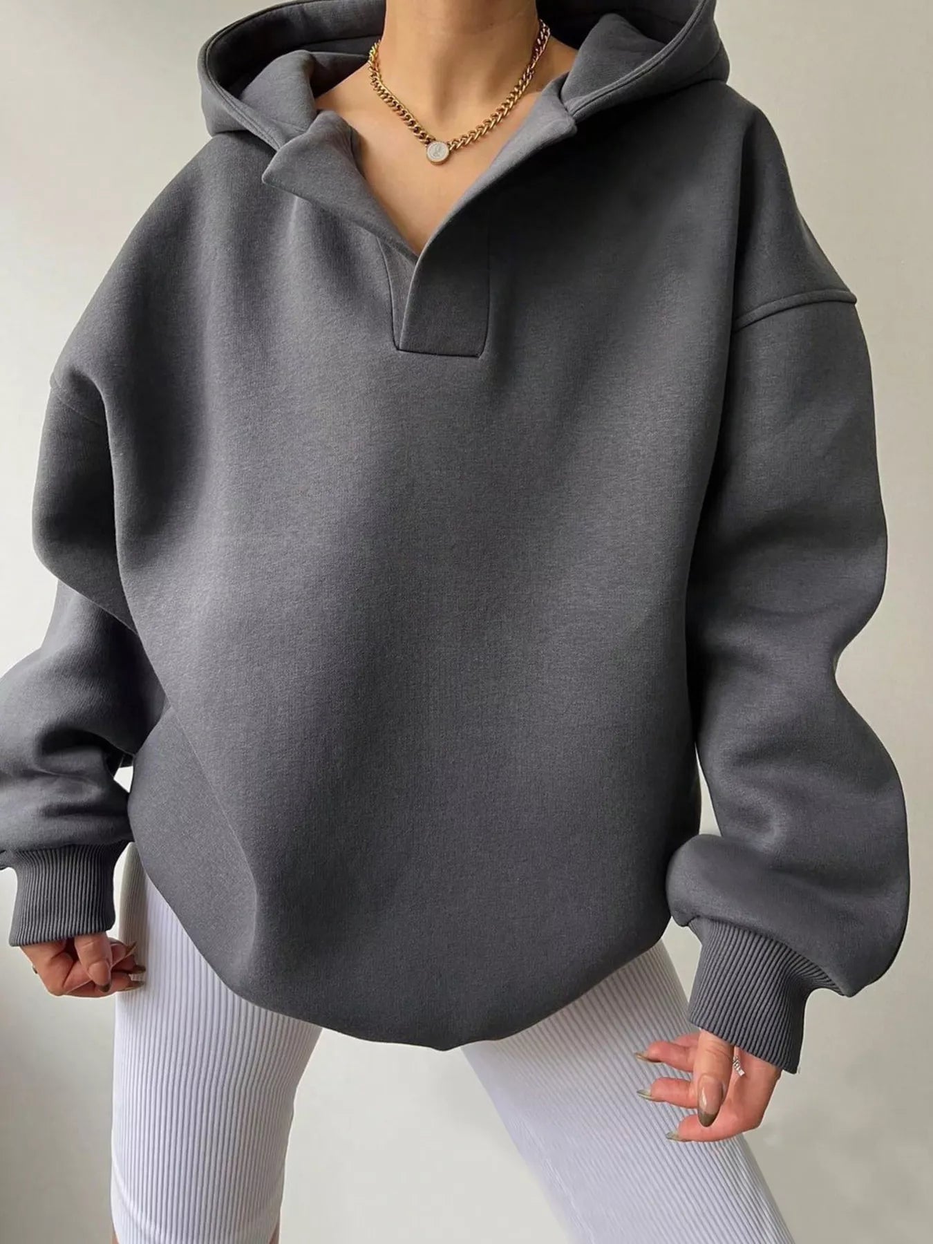 Women's oversized dropped shoulder hoodie sweatshirt in dark gray with long sleeves and relaxed fit, perfect for casual fall outfits, available in 11 colors and sizes Small–2XL.