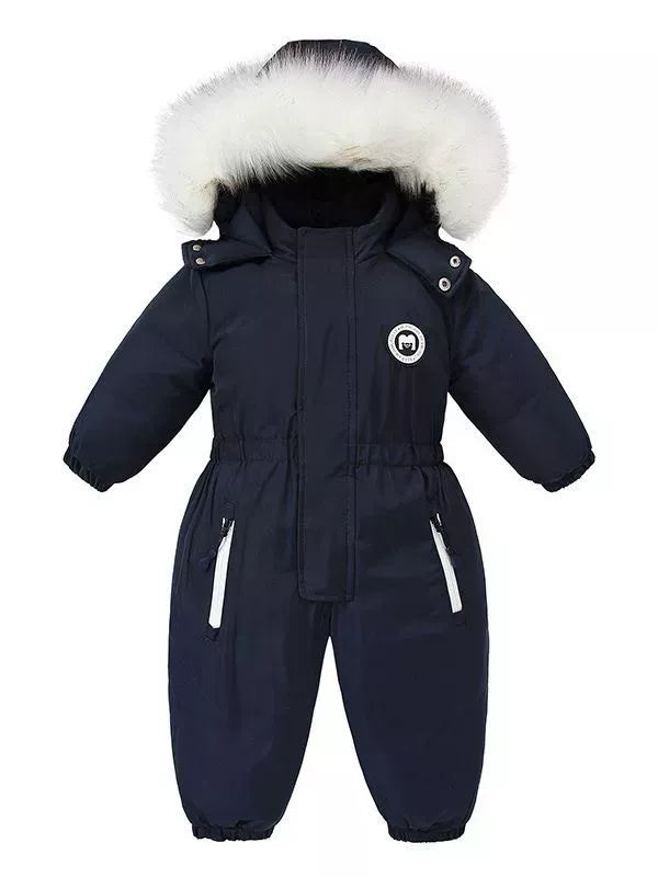 Children's dark navy one-piece winter snowsuit featuring a fluffy white faux fur-trimmed hood, rust-colored accents, elasticized waist, and front pockets.