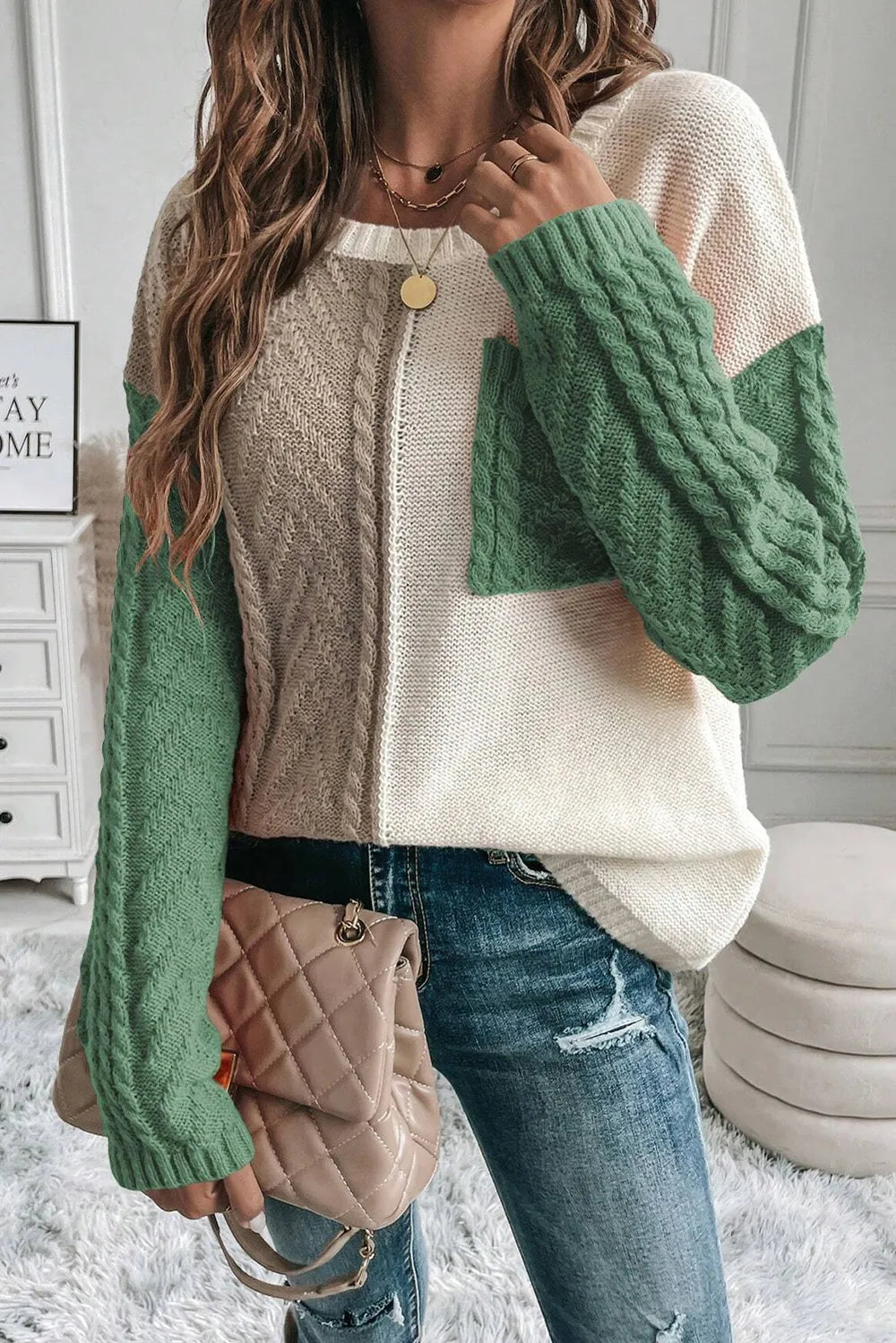 Double Take women’s gum leaf color block cable-knit drop shoulder sweater with front pocket and long sleeves.