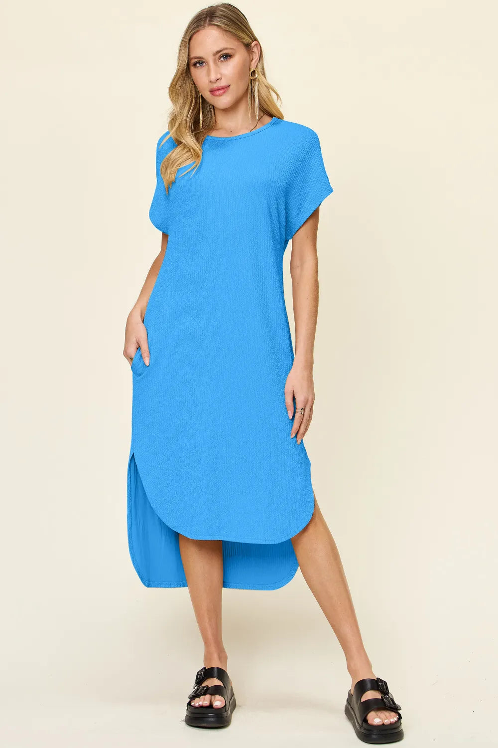 Women's sky-blue round neck short sleeve midi dress with side slit and relaxed fit, available in sizes Small–3XL.
