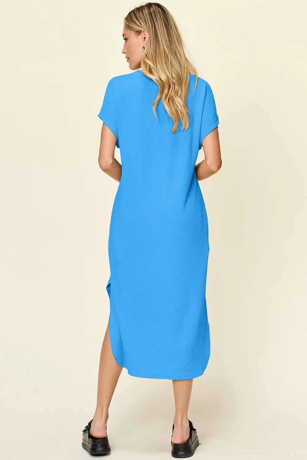 Women's sky-blue round neck short sleeve midi dress with side slit and relaxed fit, available in sizes Small–3XL.