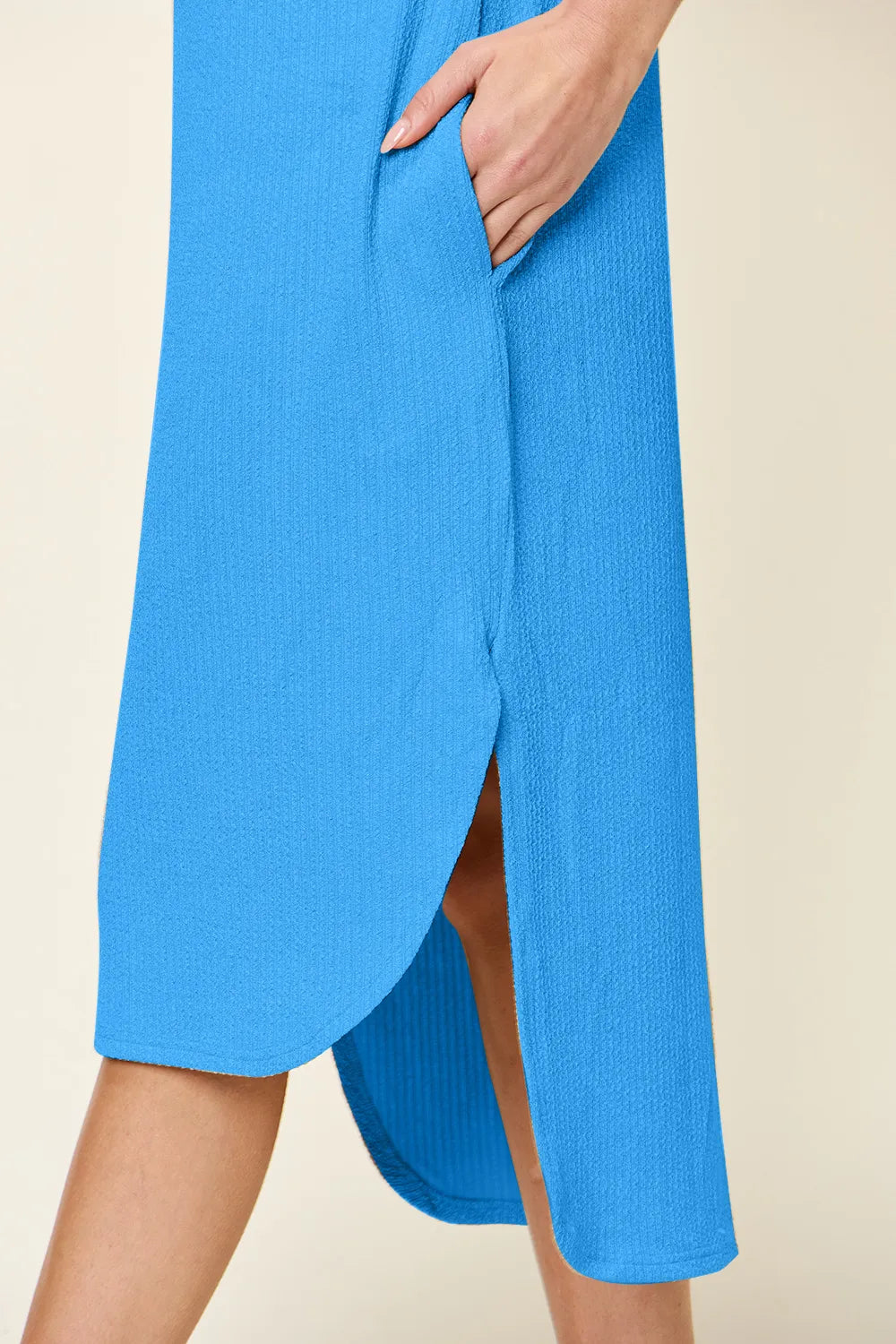 Women's sky-blue round neck short sleeve midi dress with side slit and relaxed fit, available in sizes Small–3XL.
