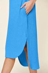 Women's sky-blue round neck short sleeve midi dress with side slit and relaxed fit, available in sizes Small–3XL.