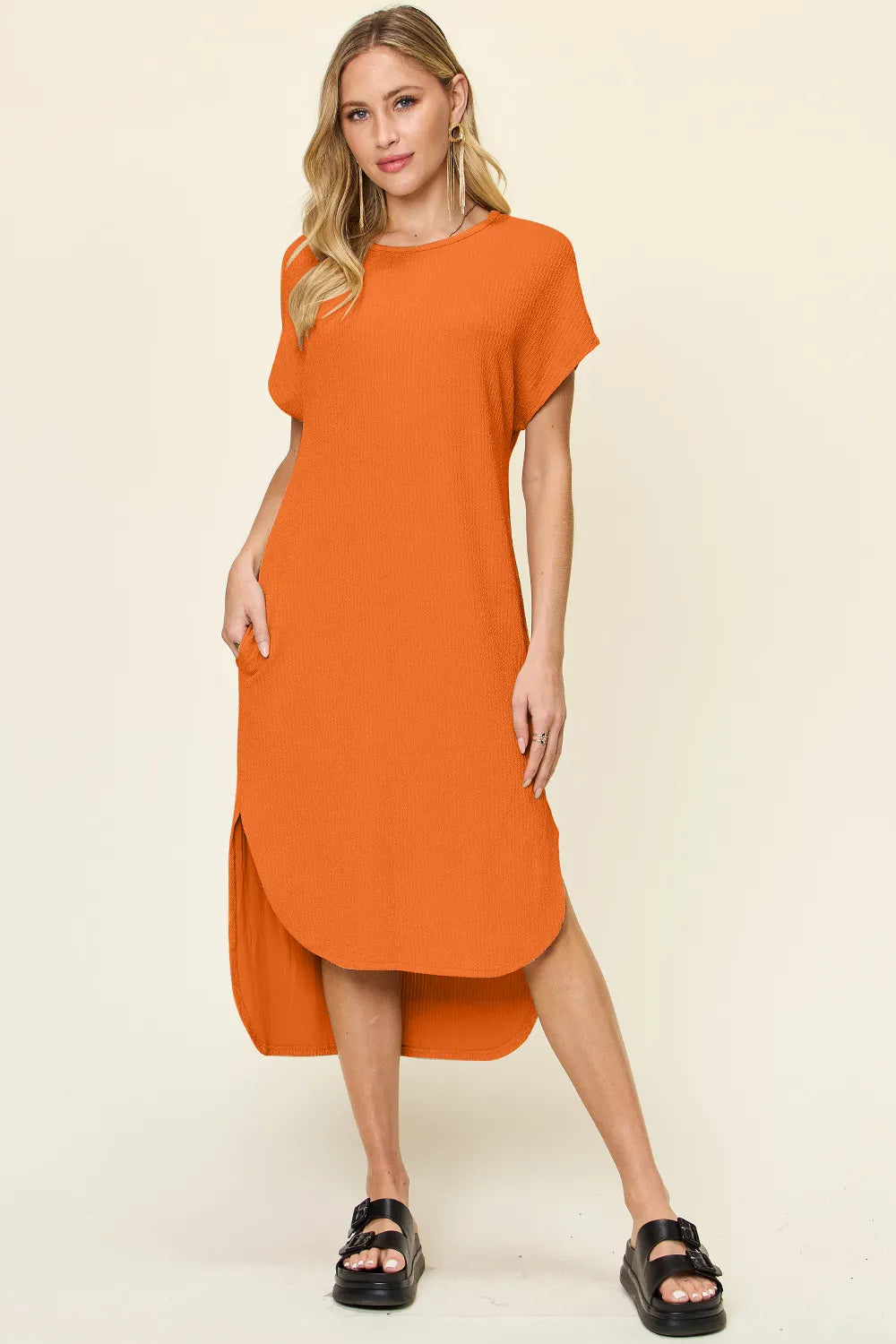Women's tangerine round neck short sleeve midi dress with side slit and relaxed fit, available in sizes Small–3XL.