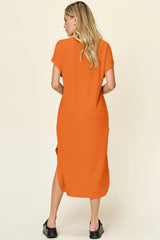 Women's tangerine round neck short sleeve midi dress with side slit and relaxed fit, available in sizes Small–3XL.