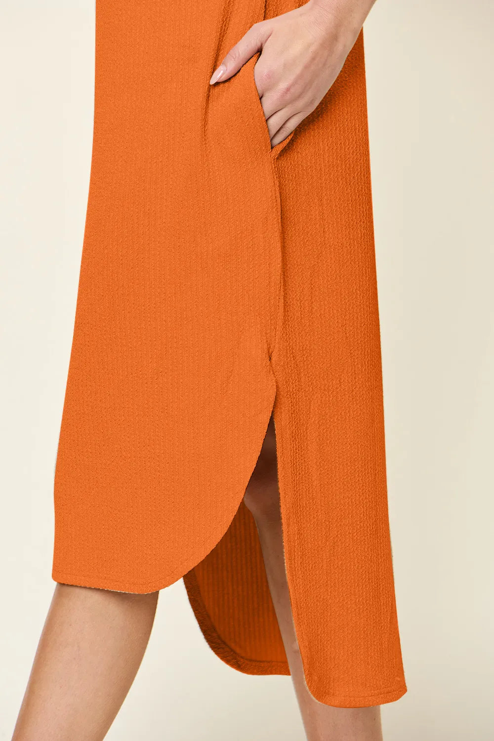 Women's tangerine round neck short sleeve midi dress with side slit and relaxed fit, available in sizes Small–3XL.