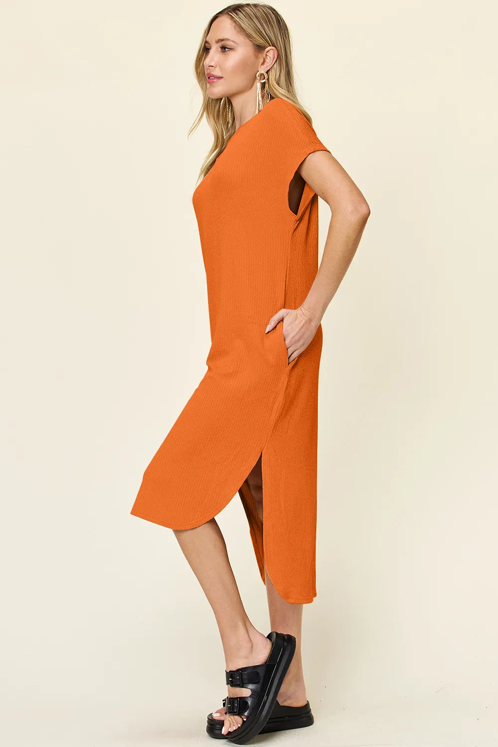 Women's tangerine round neck short sleeve midi dress with side slit and relaxed fit, available in sizes Small–3XL.