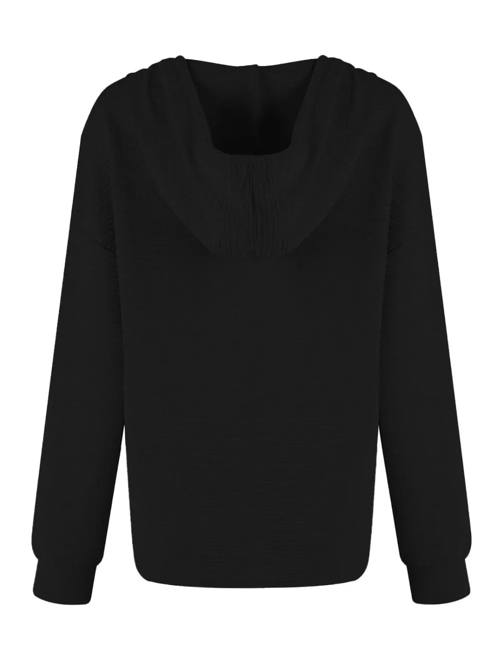 Woman wearing a black textured drawstring quarter-button long sleeve hoodie paired with black jeans, perfect for casual fall outfits, available in 10 colors and sizes Small–2XL.