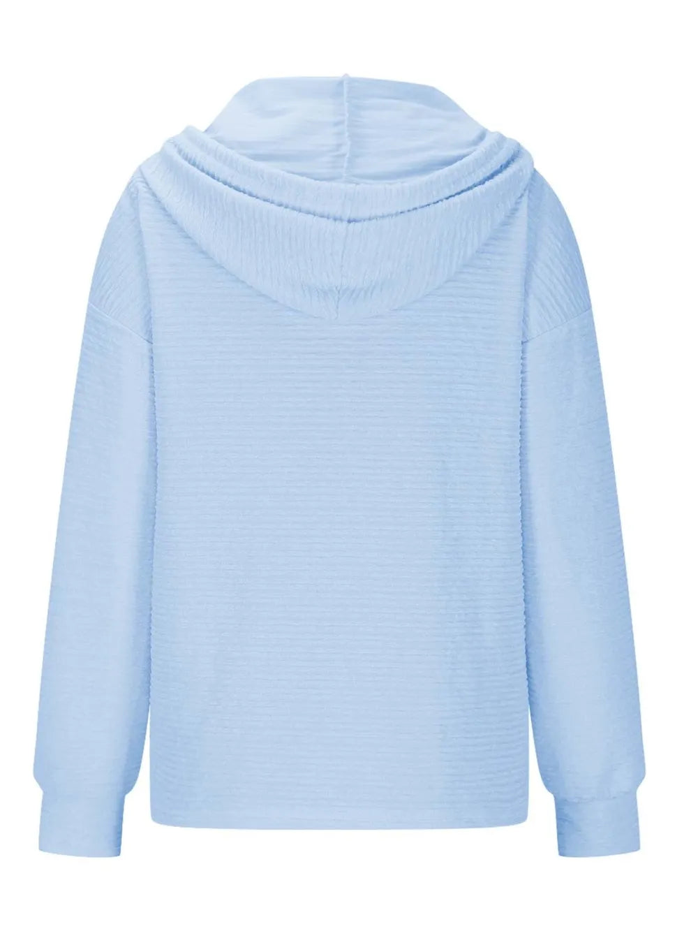 Woman wearing a pastel blue textured drawstring quarter-button long sleeve hoodie paired with black jeans, perfect for casual fall outfits, available in 10 colors and sizes Small–2XL.