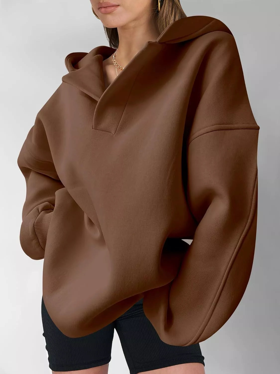 Women's oversized dropped shoulder hoodie sweatshirt in dark brown with long sleeves and relaxed fit, perfect for casual fall outfits, available in 11 colors and sizes Small–2XL.