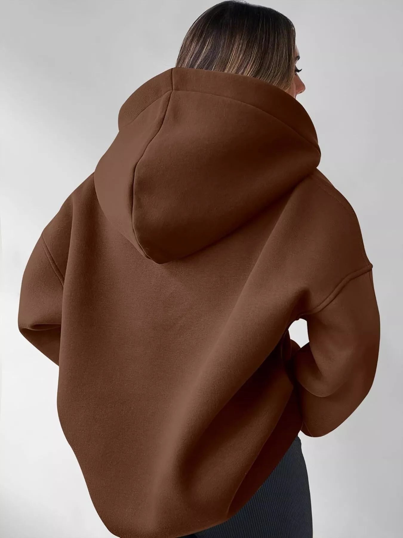 Women's oversized dropped shoulder hoodie sweatshirt in dark brown with long sleeves and relaxed fit, perfect for casual fall outfits, available in 11 colors and sizes Small–2XL.