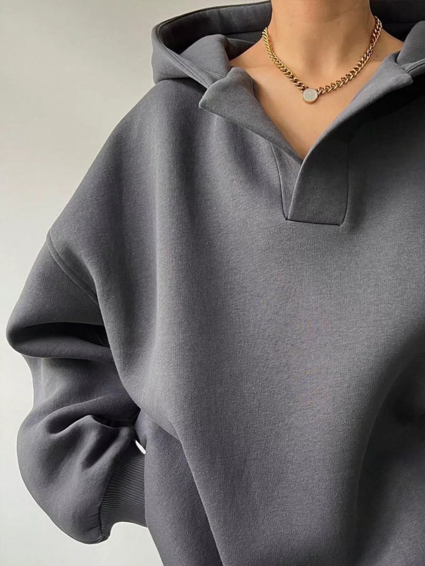 Women's oversized dropped shoulder hoodie sweatshirt in dark gray with long sleeves and relaxed fit, perfect for casual fall outfits, available in 11 colors and sizes Small–2XL.