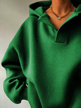 Women's oversized dropped shoulder hoodie sweatshirt in green with long sleeves and relaxed fit, perfect for casual fall outfits, available in 11 colors and sizes Small–2XL.