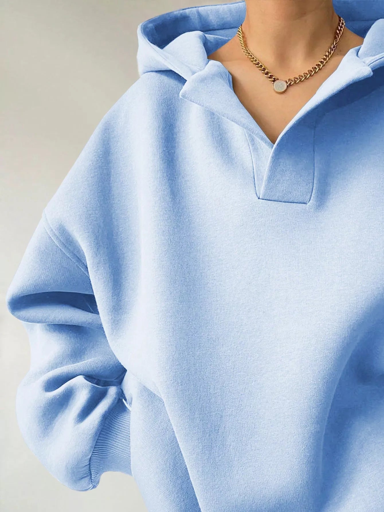 Women's oversized dropped shoulder hoodie sweatshirt in light blue with long sleeves and relaxed fit, perfect for casual fall outfits, available in 11 colors and sizes Small–2XL.