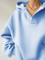 Women's oversized dropped shoulder hoodie sweatshirt in light blue with long sleeves and relaxed fit, perfect for casual fall outfits, available in 11 colors and sizes Small–2XL.