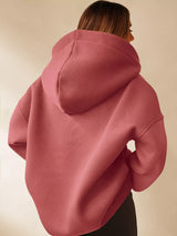Women's oversized dropped shoulder hoodie sweatshirt in lotus color with long sleeves and relaxed fit, perfect for casual fall outfits, available in 11 colors and sizes Small–2XL.