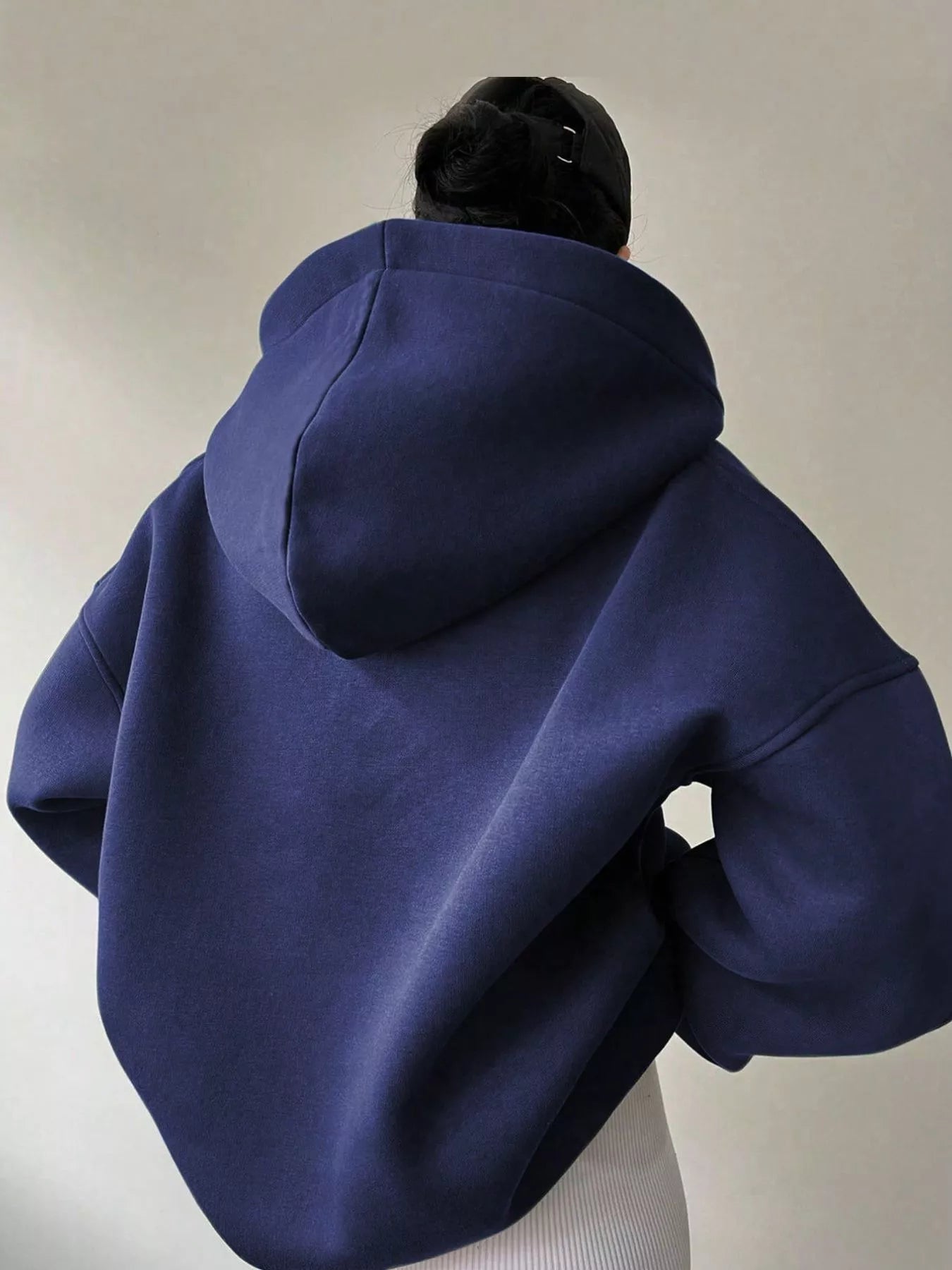 Women's oversized dropped shoulder hoodie sweatshirt in navy blue with long sleeves and relaxed fit, perfect for casual fall outfits, available in 11 colors and sizes Small–2XL.