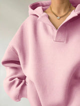 Women's oversized dropped shoulder hoodie sweatshirt in pink with long sleeves and relaxed fit, perfect for casual fall outfits, available in 11 colors and sizes Small–2XL.