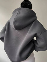 Women's oversized dropped shoulder hoodie sweatshirt in dark gray with long sleeves and relaxed fit, perfect for casual fall outfits, available in 11 colors and sizes Small–2XL.