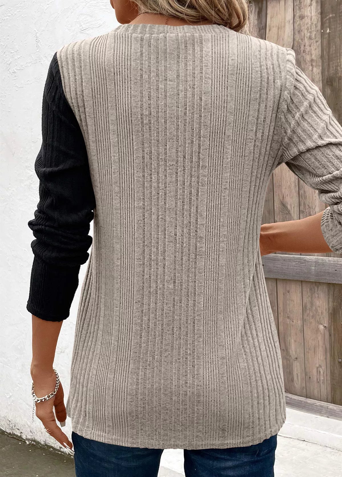 Women’s dust storm and black color block ribbed knit long sleeve top with decorative side buttons and slit detail, available in sizes Small–2XL.