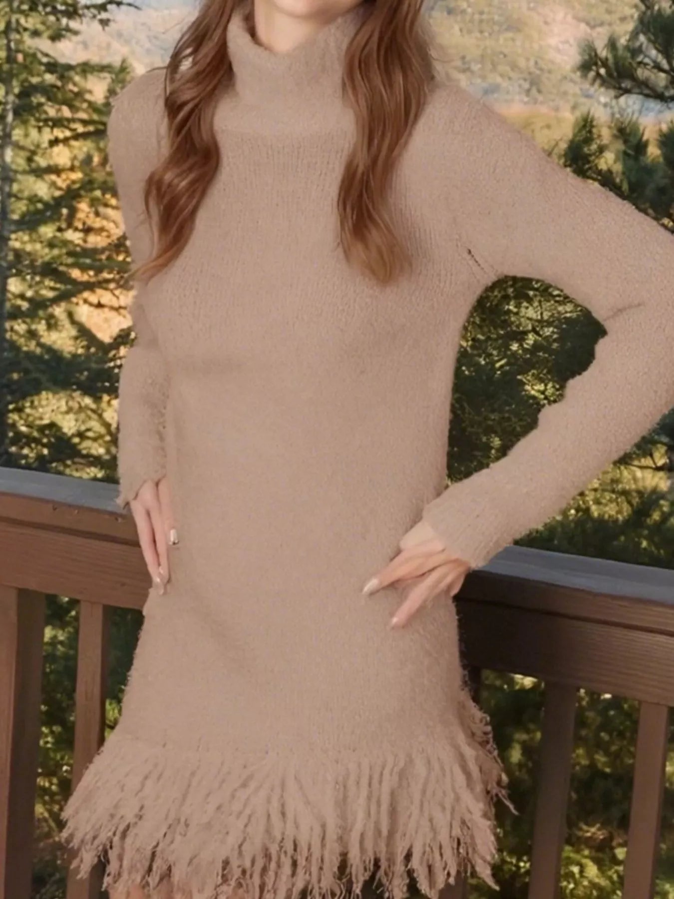 Woman wearing a khaki fringe turtleneck long sleeve sweater dress with brown knee-high boots, a cozy fall outfit from Chic Mystik Boutique.
