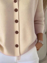 Women's apricot button-down ribbed knit cardigan with a classic collared neckline, long sleeves, and soft sweater knit, available in sizes Small–5XL.