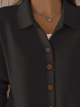 Women's black button-down ribbed knit cardigan with a classic collared neckline, long sleeves, and soft sweater knit, available in sizes Small–5XL.