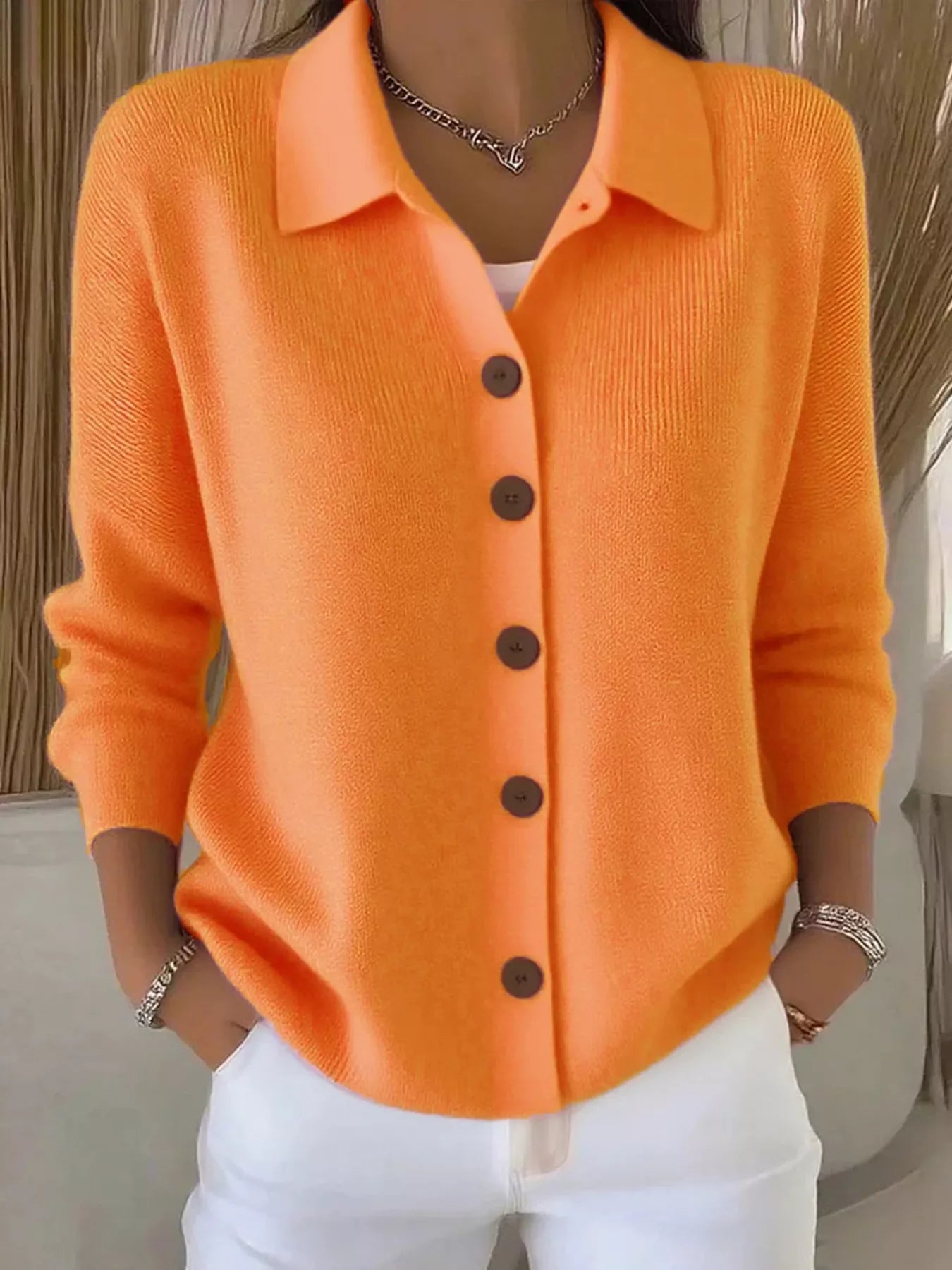 Women's orange-red button-down ribbed knit cardigan with a classic collared neckline, long sleeves, and soft sweater knit, available in sizes Small–5XL.