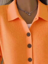 Women's orange-red button-down ribbed knit cardigan with a classic collared neckline, long sleeves, and soft sweater knit, available in sizes Small–5XL.