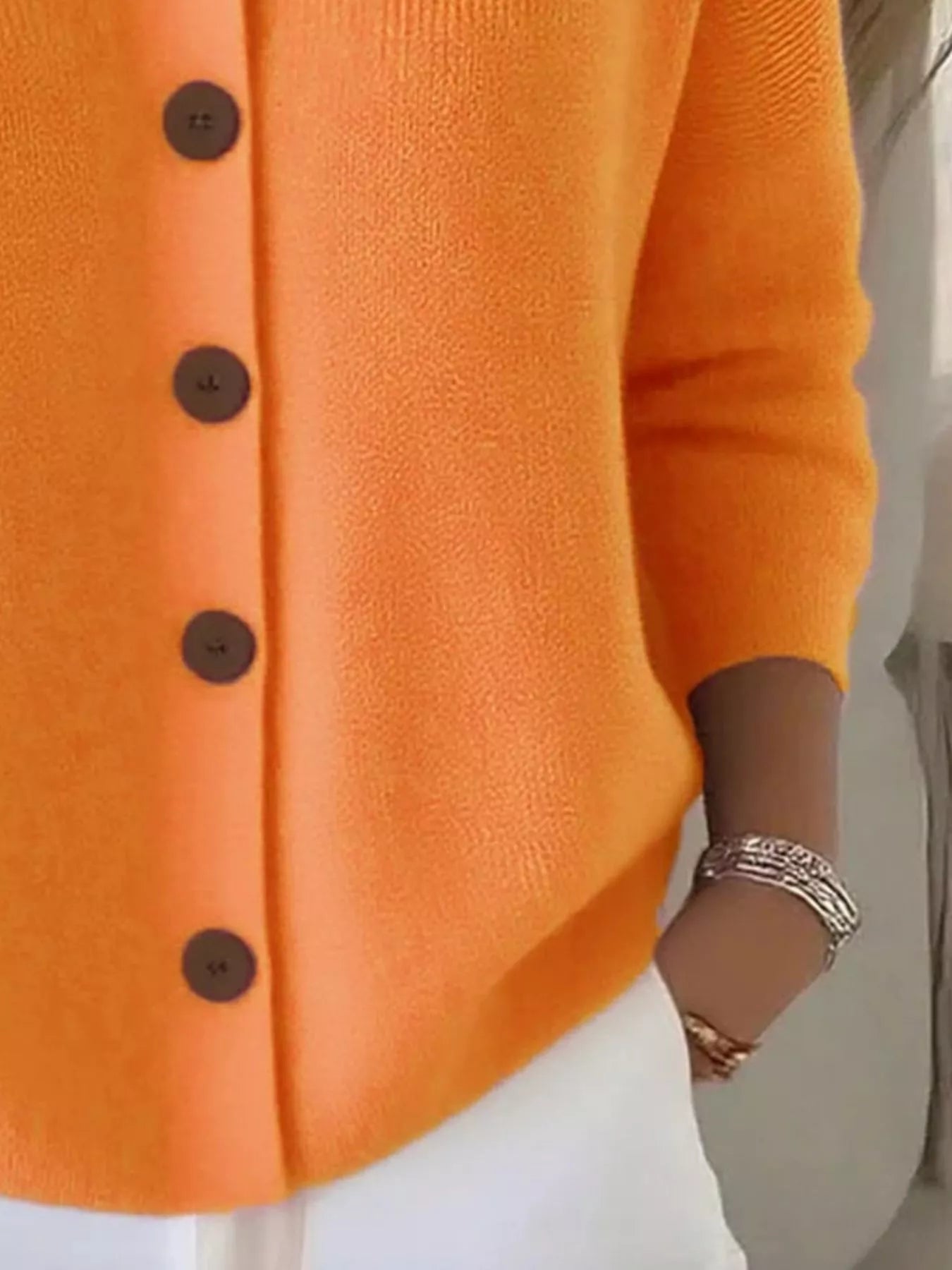 Women's orange-red button-down ribbed knit cardigan with a classic collared neckline, long sleeves, and soft sweater knit, available in sizes Small–5XL.