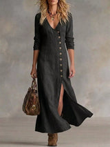 Women's black button-front maxi dress with long sleeves, V-neckline, front slit, and flowing silhouette, available in sizes Small–3XL for elegant every day and fall style.