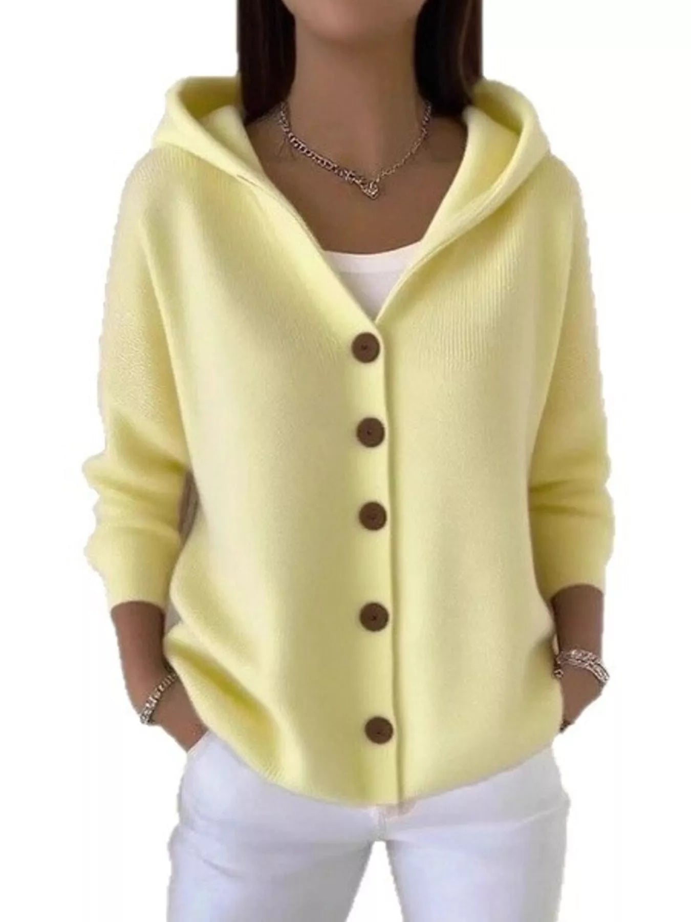 Women's light-yellow button-up knit cardigan with hood and front pockets, long sleeve lightweight sweater styled with white pants, available in sizes Small–5XL.