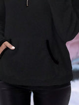 Cozy up in this full-size fleece quarter zip sweatshirt with pockets. Slightly stretchy and available in 11 colors and sizes Small–3XL for easy everyday style.