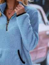Cozy up in this full-size fleece quarter zip sweatshirt with pockets. Slightly stretchy and available in 11 colors and sizes Small–3XL for easy everyday style.