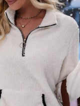 Cozy up in this full-size fleece quarter zip sweatshirt with pockets. Slightly stretchy and available in 11 colors and sizes Small–3XL for easy everyday style.