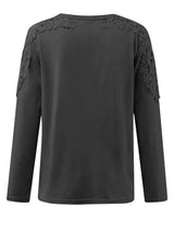 Black long-sleeve top with lace details on a white background showcasing the back of the top.