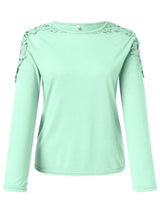 Light green long-sleeve top with lace details on a white background