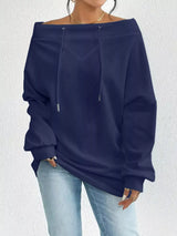 Navy blue off-shoulder sweatshirt worn by a person on a white background