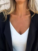 Women's Black open front 3/4 sleeve casual cardigan layered over a white V-neck tank with blue jeans, lightweight cardigan available in sizes Small–5XL.