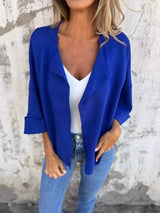 Women's Royal Blue open front 3/4 sleeve casual cardigan layered over a white V-neck tank with blue jeans, lightweight cardigan available in sizes Small–5XL.