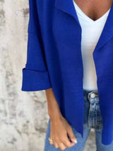 Women's Royal Blue open front 3/4 sleeve casual cardigan layered over a white V-neck tank with blue jeans, lightweight cardigan available in sizes Small–5XL.