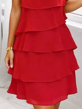 Scarlet tiered dress on a white background