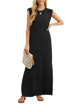 Women's black sleeveless maxi tank dress with side pockets and side slit, casual round neck dress available in sizes Small–5XL, styled with white sandals.