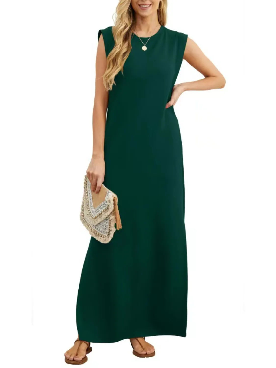 Women's dark green sleeveless maxi tank dress with side pockets and side slit, casual round neck dress available in sizes Small–5XL, styled with white sandals.