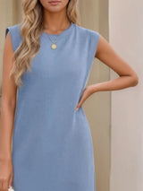 Women's dusty blue sleeveless maxi tank dress with side pockets and side slit, casual round neck dress available in sizes Small–5XL, styled with white sandals.