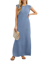 Women's dusty blue sleeveless maxi tank dress with side pockets and side slit, casual round neck dress available in sizes Small–5XL, styled with white sandals.
