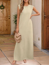 Women's Khaki sleeveless maxi tank dress with side pockets and side slit, casual round neck dress available in sizes Small–5XL, styled with white sandals.