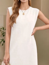 Women's white sleeveless maxi tank dress with side pockets and side slit, casual round neck dress available in sizes Small–5XL, styled with white sandals.
