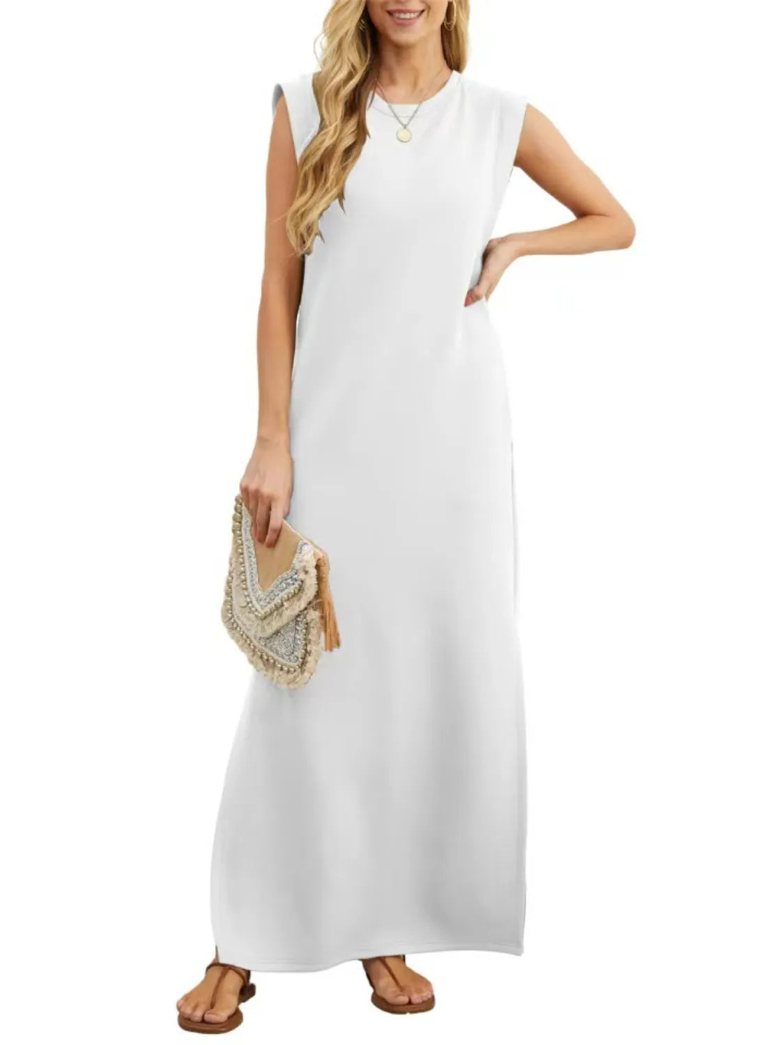 Women's white sleeveless maxi tank dress with side pockets and side slit, casual round neck dress available in sizes Small–5XL, styled with white sandals.