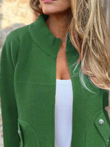 Women's green textured knit zip-up outerwear jacket with decorative button pockets, lightweight fall jacket available in sizes Small–5XL, styled over a white tank and black jeans.